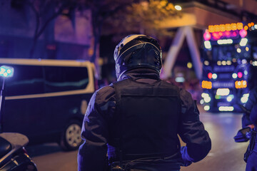 Bustling Metropolis, Traffic Police Motorcyclists Through the Night Streets, Emphasizing the...