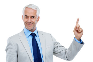 Senior man, pointing and portrait with suit in studio, white background and sharing future ideas. Businessman, presentation and announcement with wisdom, experience and advice for business careers.