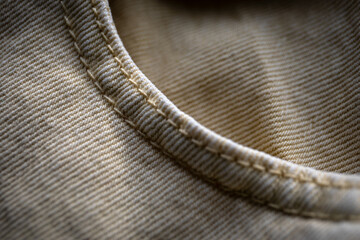 Close-up of denim texture, place for tucking in belt