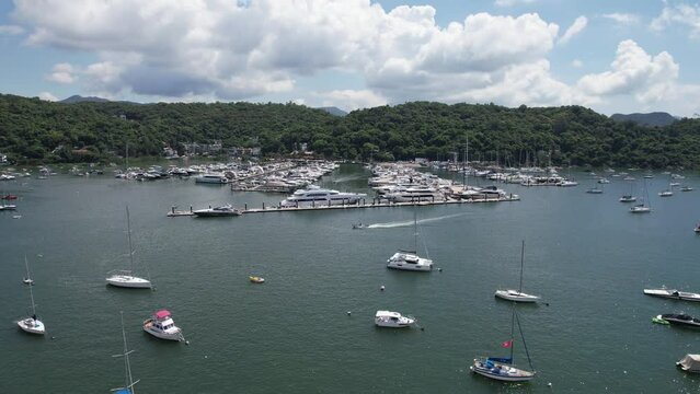 Sai Kung Hebe Haven Marina Cove,a back garden of Hong Kong,Yacht Club with hundreds of small private boats anchored, fishing villages, beautiful scenery, hiking trails, beaches and islands, geological
