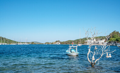 The scenic views from Gümüşlük bay with yachts in Bodrum, Turkey