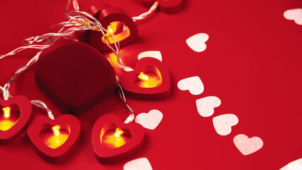 Valentine's day composition. Heart on a red background. Copy space
