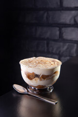 Tiramisu dessert in a glass bowl