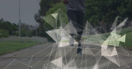 Image of rotating communication network over male athlete with prosthetic leg running