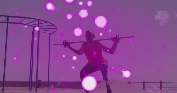 Image of pink communication networks over male athlete with running blade exercising outdoors