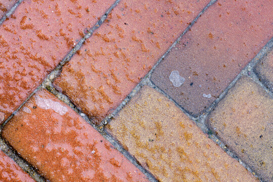 CClose up of slippery conditions caused by glaze ice on surface of the street during the winter season.