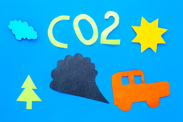 Kids paper car and traffic fumes - CO2 carbone dioxide control concept
