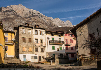 The historic hill village of Timau in Udine Province, Friuli-Venezia Giulia, North East Italy. Part of the Paluzza municipality, it is a German linguistic enclave in Val But in the Carnia alps - obrazy, fototapety, plakaty
