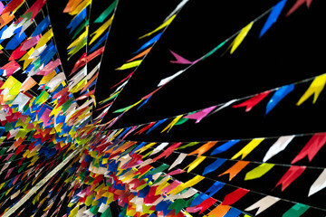 Colorful Abstract Ribbons Streaming Across a Dark Background