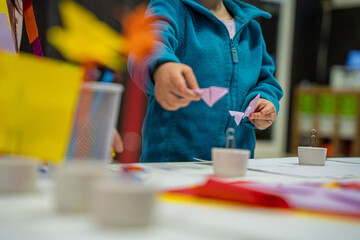 artist at work in the workshop, children hands