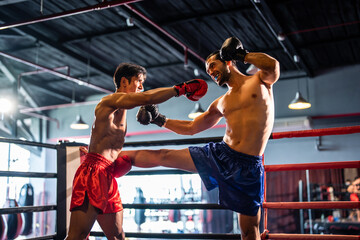 Two young professional boxer having a competition tournament on stage. 