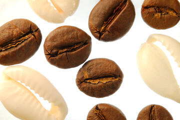 Coffee beans placed together with similar shaped decorative object