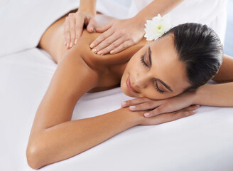 Obraz na płótnie Canvas Woman, back massage and body treatment for healing, wellness and muscle therapy for bodycare. Female person, masseuse and health by dermatology, calm and resting at resort hotel and peace or zen