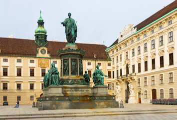 Fototapeta na wymiar Bronze statue of the first Austrian Emperor Francis II, mounted on a multi-tiered pedestal with the signature 