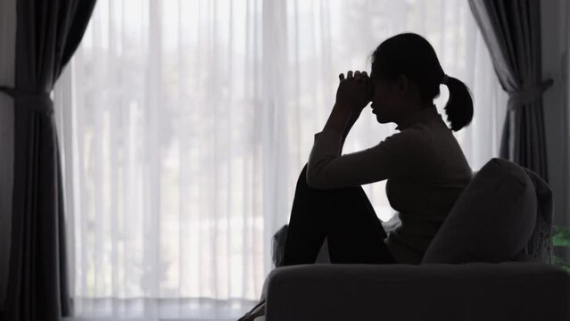 Shadow of a woman. She is depressed and depressed. There are problems. accumulated stress Relationship problems and emotional abuse.