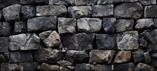 Volcanic basalt bricks wall texture. Wall of Volcanic rock bricks wallpaper. Volcanic rock bricks wall. Horizontal format for banners, posters, advertising.