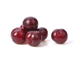 Red plums fruit isolated on white background
