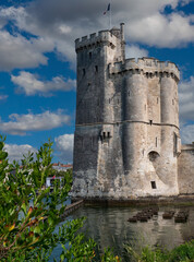 Fototapeta na wymiar La Rochelle, France old harbour with medieval castle towers on Atlantic coast of Charente-Maritime