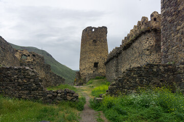 Fototapeta na wymiar Khertvisi fortress. Defence towers and walls made from stone.