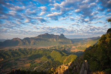 Fototapeta na wymiar Vang Vieng Laos, Big Pha Ngern View Point Top, amazing view with air balloons in the air. HDR picture, simple beautiful