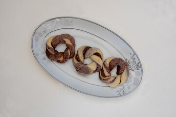 Biscuit cookies assortment on a white background, top view