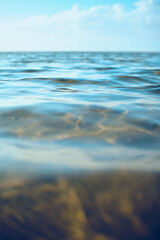 blue sky reflecting in water surface. High quality photo