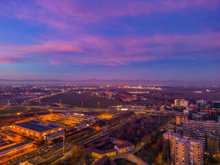City in Italy with beautiful Sunset . Cityscape from drone. Italy, Lombardy, Milan, San Donato Milanese