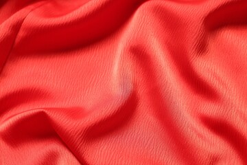Texture of red crumpled fabric as background, top view