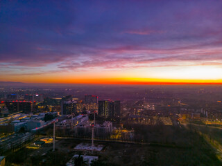 San Donato Milanese City in Italy with beautiful Sunset . Cityscape from drone. Italy, Lombardy, Milan, San Donato Milanese