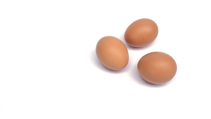 several brown chicken eggs on an isolated background
