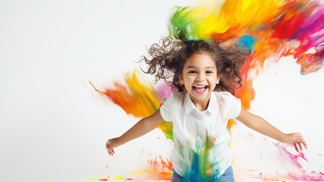 Little girl playing with colors on white background