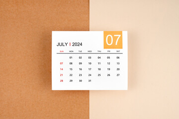 July 2024 calendar page on yellow background.