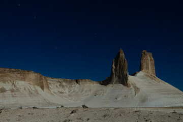 Night scene with the rock pinnacles of Bozzhira valley, Kazakhstan