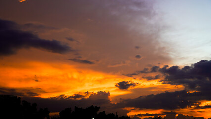 a beautiful view of the charming orange afternoon sky.