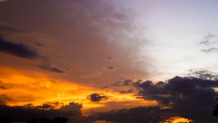 a beautiful view of the charming orange afternoon sky.