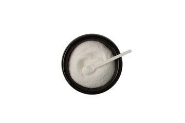 Sodium erythorbate or Sodium isoascorbate in black ceramic dish with measuring spoon, top view. Food additive E316 with chemical formula C6H7NaO6.White crystalline powder