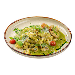 Portion of pasta fettuccine with pesto sauce