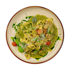 Portion of pasta fettuccine with pesto sauce