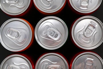Energy drink in cans, top view. Functional beverage