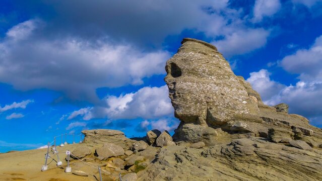 Sphinx stony landmark in Bucegi national park against a blue sky