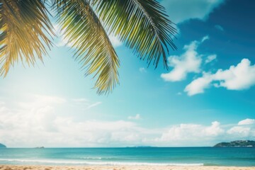 Tropical beach with palm tree and blue sky background
