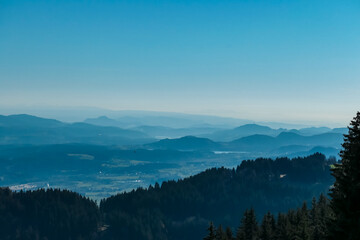 Fototapeta premium Scenic morning view from Dreilaendereck on Pyramidenkogel and Kathreinkogel in Karawanks in Carinthia, Austria. Borders between Austria, Slovenia, Italy. Looking at Rosental valley