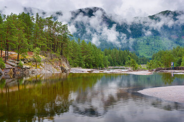 Otra River flowing through a beautiful mountain landscape around Valle, Norway
