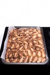 Baking of traditional roll apple cake with nuts, raisins and cinnamon covered with egg white snow