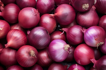 Top view of many raw whole red onions
