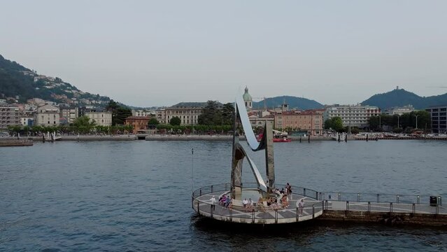 Drone shot over Life Electric sculpture on Como lake, Italy