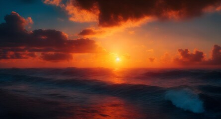 the sun sets over an ocean and waves with a cloud in the background