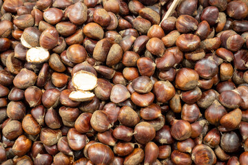 chestnuts cooked on the stove and eaten, fresh raw chestnuts from the forest, the fruit of the chestnut tree,