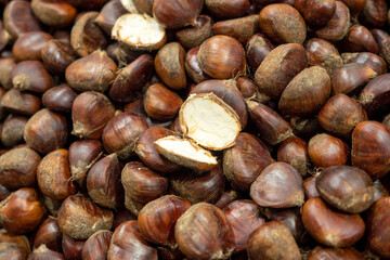 chestnuts cooked on the stove and eaten, fresh raw chestnuts from the forest, the fruit of the chestnut tree,