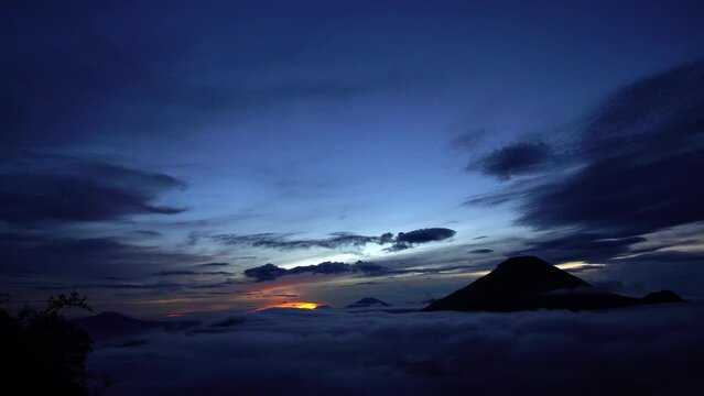 Timelapse of sunrise over the mountains in Dieng, Central Java, Indonesia